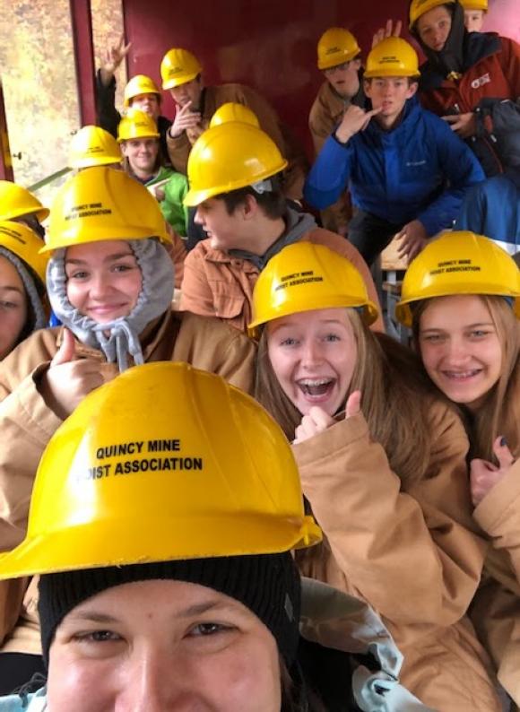 Decked out in hard hats, students learn about copper mining at the Quincy Mine that operated between 1846 and 1945, although some activities continued through the 1970s.